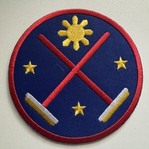 Crossed brooms patch